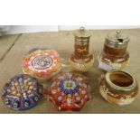 A Royal Doulton three piece condiment set with silver plated tops (one a/f) - sold with three