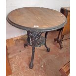 A pub table with cast iron base