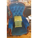 A 19th Century mahogany part show frame spoon back drawing room armchair with blue velour button