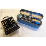 A vintage travelling vanity set - sold with a necessaire purse with bone and white metal contents