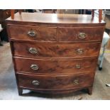 A 3' 5 1/2" 19th Century mahogany, ebony strung and cross banded bow front chest of two short and