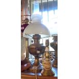 An Aladdin table oil lamp - sold with a brass table lamp and a leather wallet