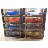 Eight boxed Maisto die cast cars