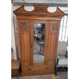 A 4' 2 1/2" Edwardian satin walnut wardrobe with poorly repaired cornice, and hanging space enclosed