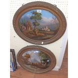 A pair of 19th Century gilt gesso oval framed crystoleums on domed glass, one depicting a rural town