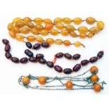 A red amber bead necklace and a polished hardstone necklace (both damaged) - sold with a white metal
