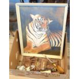 A box of assorted collectable including tiger painting, Native American items, elephant bookends,