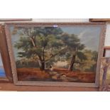 A parcel gilt framed relined 19th Century oil on canvas, depicting a woodland track with horseman