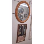 Two small modern wall mirrors comprising one in polished pine framed, the other stained wood and