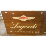 A vintage polished Italian walnut dealership sign for Lagonda The Thoroughbred Car, with transfer