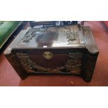 A 3' 4" 20th Century Oriental camphorwood lift-top linen chest, with high relief carved decoration
