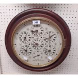 A reproduction mahogany cased dial wall timepiece "Time of Six Nations" with six battery movements -