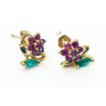 A pair of marked 375 yellow metal flowerhead pattern ear-rings, each set with small rubies and