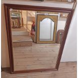 A modern stained pine and gilt lined bevelled oblong wall mirror - 3' 8 1/2" X 34 1/2"