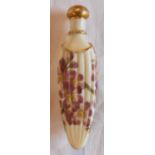 A late 19th to early 20th Century Royal Worcester lay down scent bottle of reeded tongue shaped