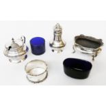 A harlequin silver three piece condiment set - sold with a silver napkin ring with name "Anne"