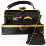 A vintage ladies Evans Elegance vanity handbag with fitted purse, lipstick holder, compact,