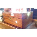 A Victorian mahogany writing slope with inkwell and dip pen, and refitted interior