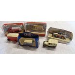 A bag of assorted advertising and other model vans