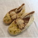 A pair of antique child's velvet shoes with embroidered decoration and seed pearl embellishments