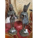 A pair of Indian weighted cast bronze deity figures