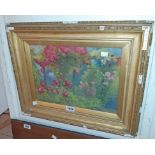 Louise Harding: a gilt framed 19th Century watercolour, depicting a garden and rose arch - signed