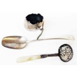A Victorian silver sifter ladle with mother-of-pearl handle, a damaged Georgian table spoon and a