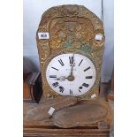 A 19th Century French comtoise wall clock with ornate embossed brass facia enamelled dial marked