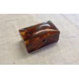 A tortoiseshell trinket box