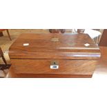 A 15 3/4" Victorian walnut dome topped writing slope with part fitted interior and large brass