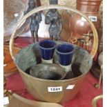 A brass preserve pan, an antique mortar, and a pair of Lovetts Langley spill vases