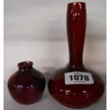 Two pieces of early 20th Century Bernard Moore pottery comprising a bottle vase with flambe glaze