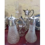 Three moulded glass claret jugs with silver plated mounts, a pewter lidded tankard and a decanter