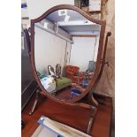 A 20th Century stained mixed wood framed shield shaped swing dressing table mirror
