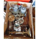A box containing silver plated and brass candlesticks, pewter items, etc.