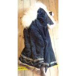 A vintage Eskimo coat with stitched decoration and quilt lining