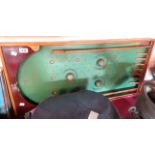 A vintage painted bagtelle board with ball bearings