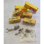 Four vintage boxed Bosch spark plug pattern lighters and two similar LED torch keyrings