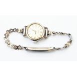 A Buren lady's steel cased Grand Prix wristwatch, on Montal bracelet - no box or papers