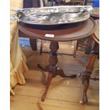 A 17 3/4" mahogany pedestal wine table, set on turned pillar and tripod base - various repairs and