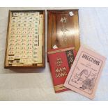 A 1950`s boxed bone and bamboo Mah-Jong set with instructions, dice, Jokers and wind discs