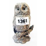 A 4 1/2" marked 900 white metal filled model of a perching owl