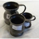 A set of three graduated Victorian pewter measures - 1/2 gill to 1/2 pint