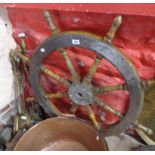 An old eight spoke ship's wheel