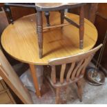 A late 20th Century oak effect draw-frame extending dining table with single leaf, set on moulded