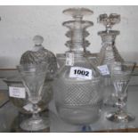 Seven 19th Century cut glass items including two decanters (one a/f), a pair of small wines, hobnail