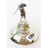 An early 20th Century silver golfing trophy lid with cast figure of a golfer to top - now as a