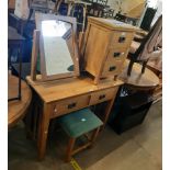 A 3' 3 1/2" polished light oak dressing table with frieze drawer and slatted standard ends - sold