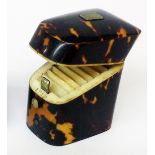 A mid 19th Century tortoiseshell and ivory lined needle case in the form of a knife box, with silk