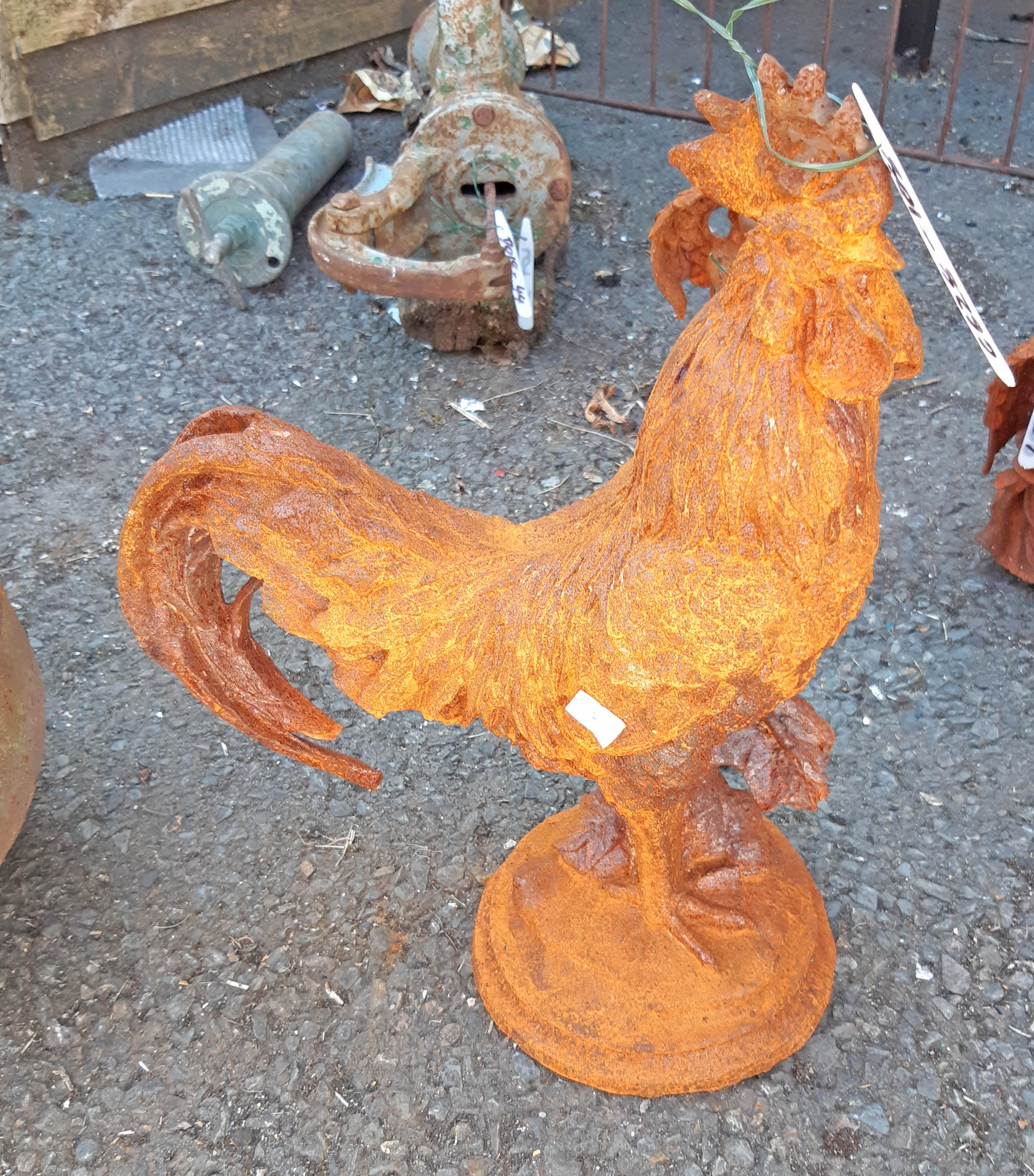 A cast iron cockerel